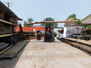 Forklift moving extra large walnut slab